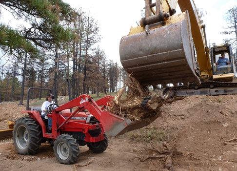 https://rivercrossinginc.tripod.com/firepictures/backhoetractor.jpg